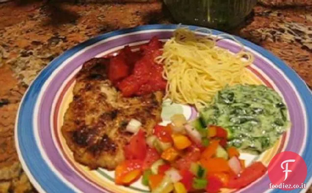 Tilapia in crosta di erbe e parmigiano con salsa di pomodoro veloce