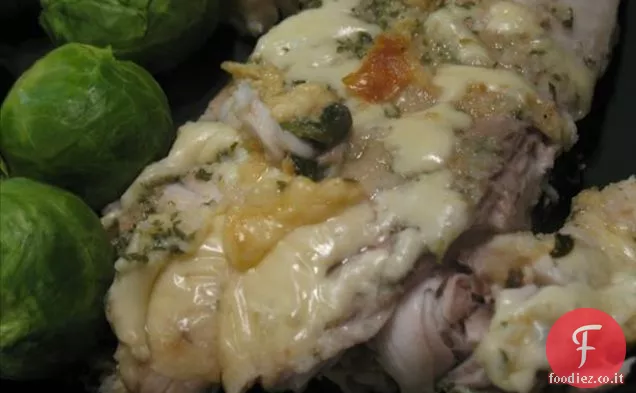 Filetti di tilapia al forno con salsa di cipolla francese leggera