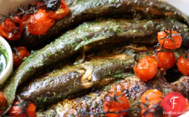 Pesce intero in salsa di erbe fini