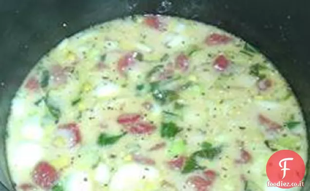 Zuppa cremosa di vongole, granchi e verdure