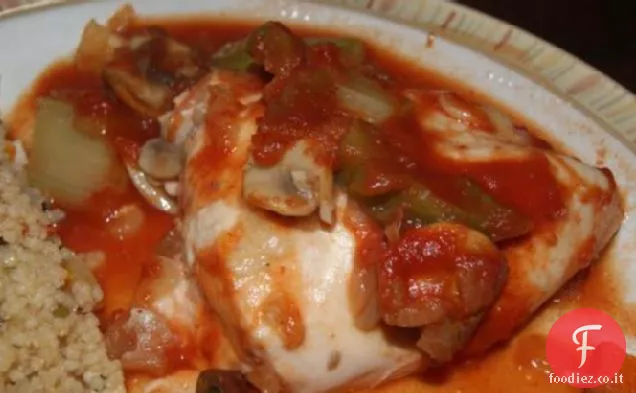 Pollo soffocato in salsa di vino