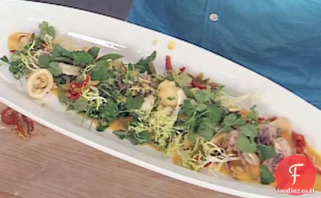 Calamari croccanti e insalata di conchiglie con vinaigrette all'arancia