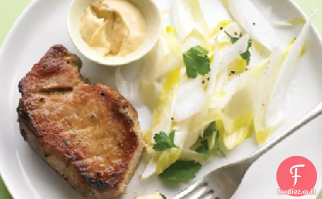 Braciole di maiale con insalata di indivia e Senape di cumino