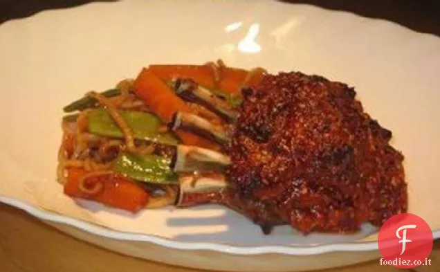 Cremagliere di agnello in crosta di sesamo al pomodoro