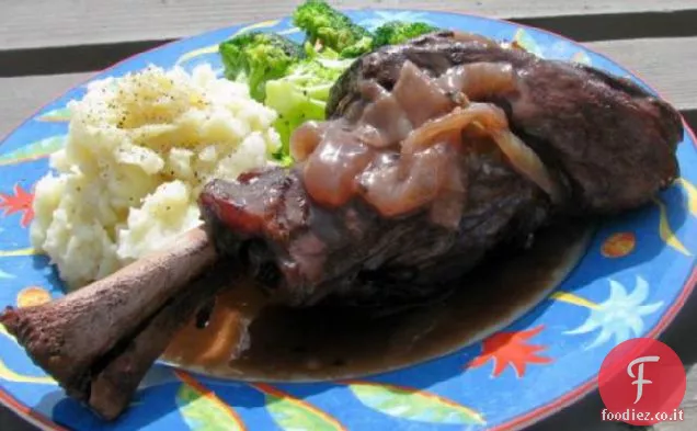 Stinchi di agnello al vino rosso e alle erbe