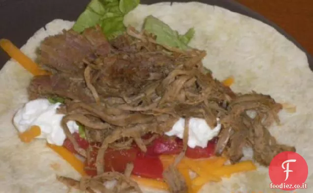 Tacos di manzo tagliuzzato a cottura lenta