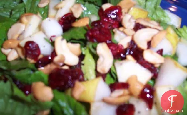 Insalata fruttata con condimento di semi di papavero